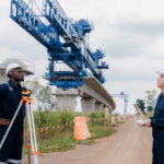 Engineer surveyor team Use drone for operator inspecting and survey construction site. Surveyors or explorer use drones to view construction sites or check security